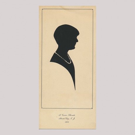
        Front of silhouette, with woman looking right, in a square painted frame.